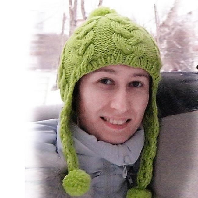 Шапочка с ушками и косами. Вязание на спицах