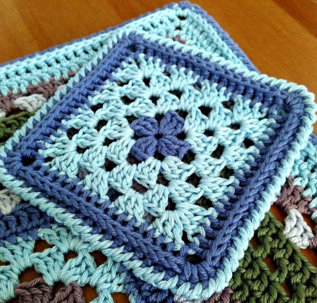 Granny square crochet coaster.